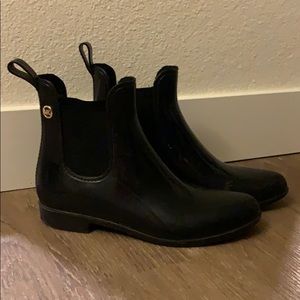 Micheal Kors Black and Gold Booties